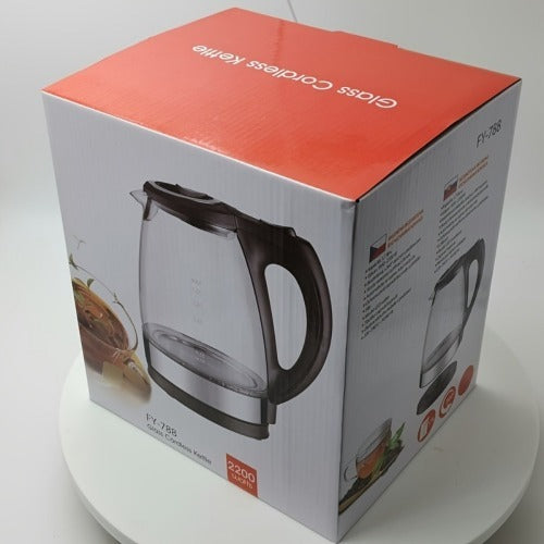 Box packaging of a glass cordless kettle with branding and product details.