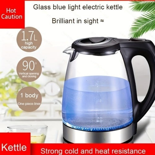 Glass electric kettle with blue light on a white background