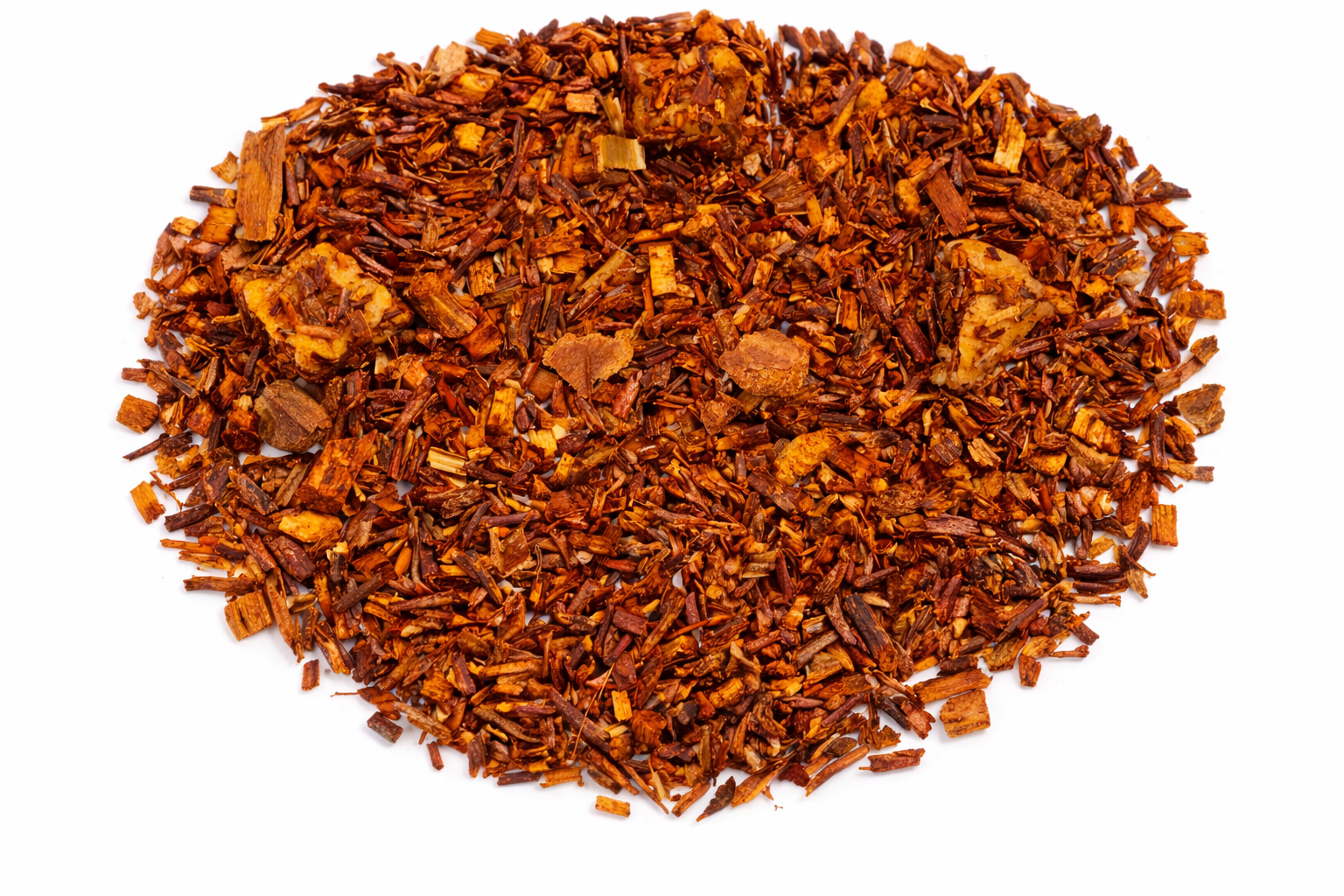 Dried brown leafy substance on a white background