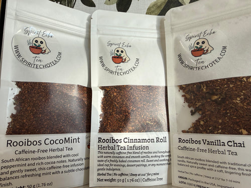 Three packages of Spiritecha tea with visible tea and branding.